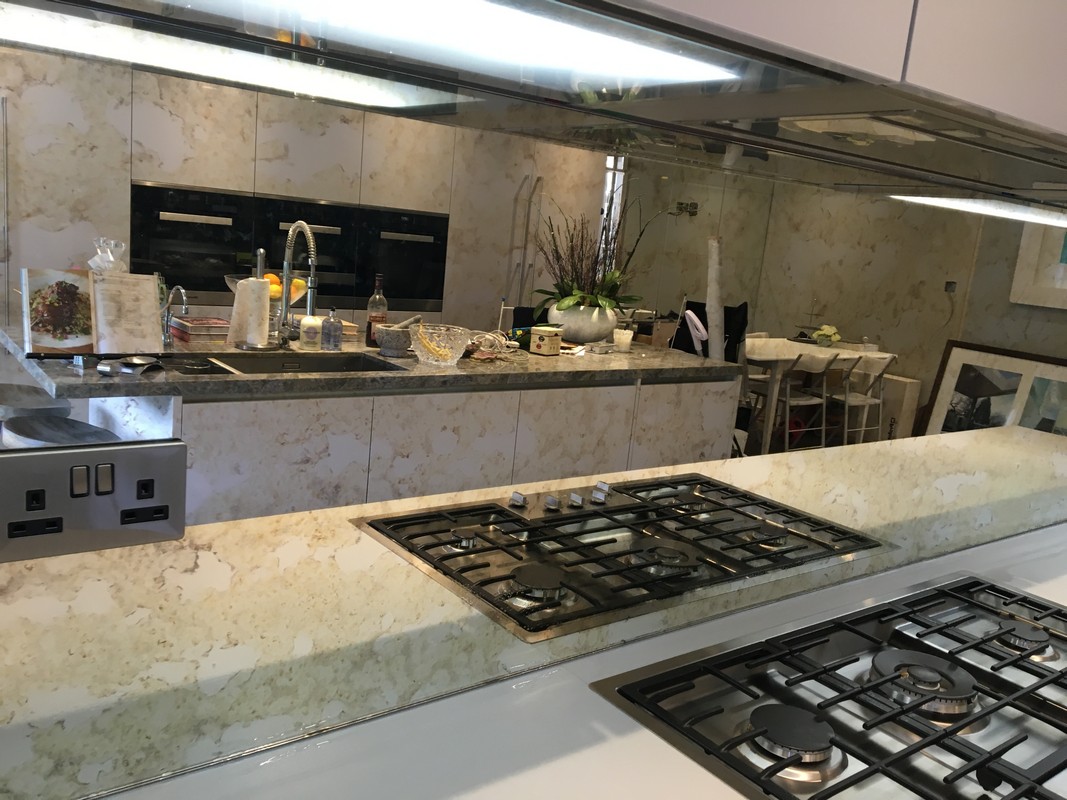 Mirror glass splashback in Maida Vale luxury kitchen