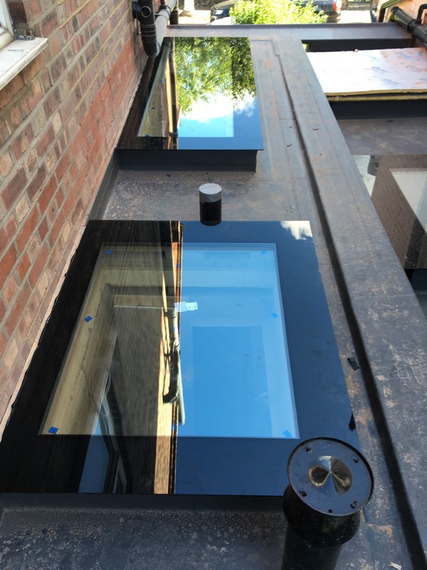 Multiple flat roof skylights on extension in Maida Vale